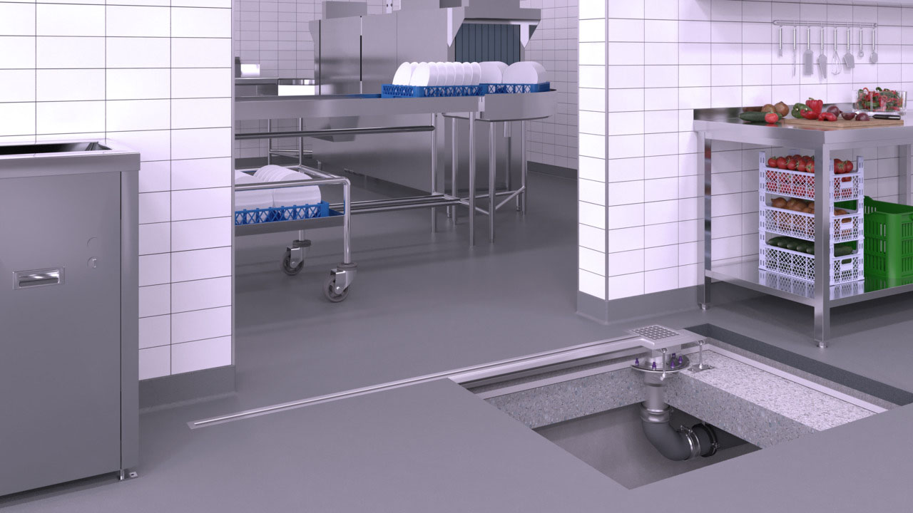 Exemple d'installation d'un caniveau à fente en acier inoxydable dans un passage d'une cuisine industrielle Exemple d'installation d'un caniveau à fente en acier inoxydable dans un passage d'une cuisine industrielle